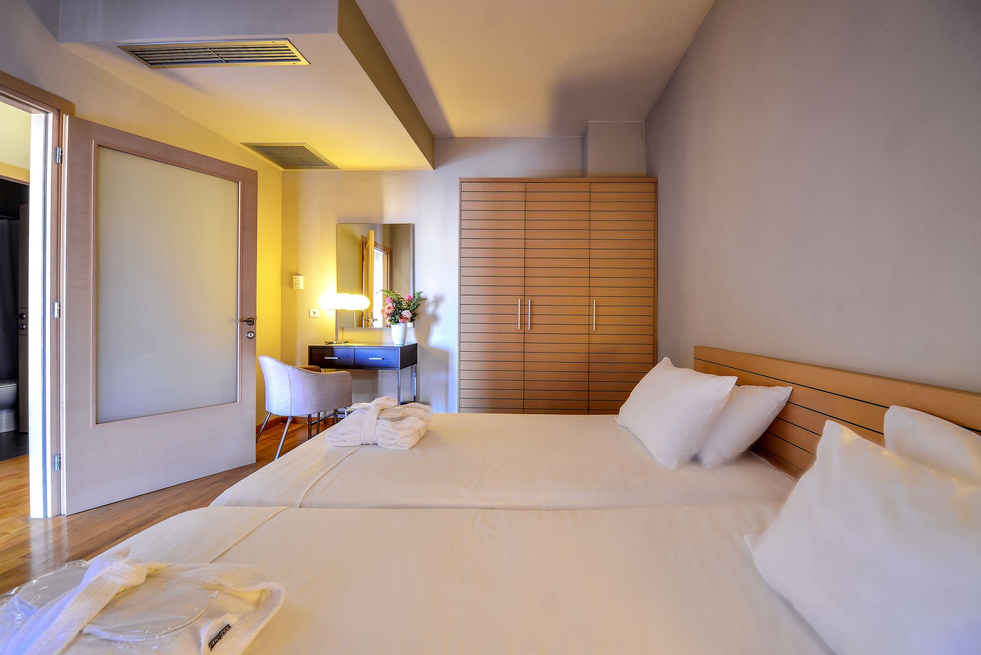 Spacious rooms with natural elements in design and comfortable relaxing colours for convenient stays away from home.
