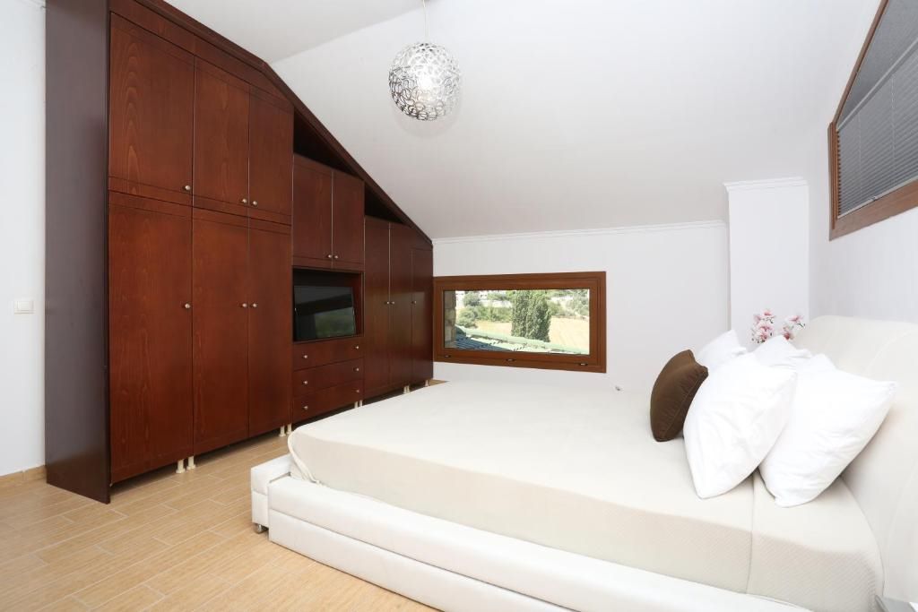 masterbedorom of vila 1