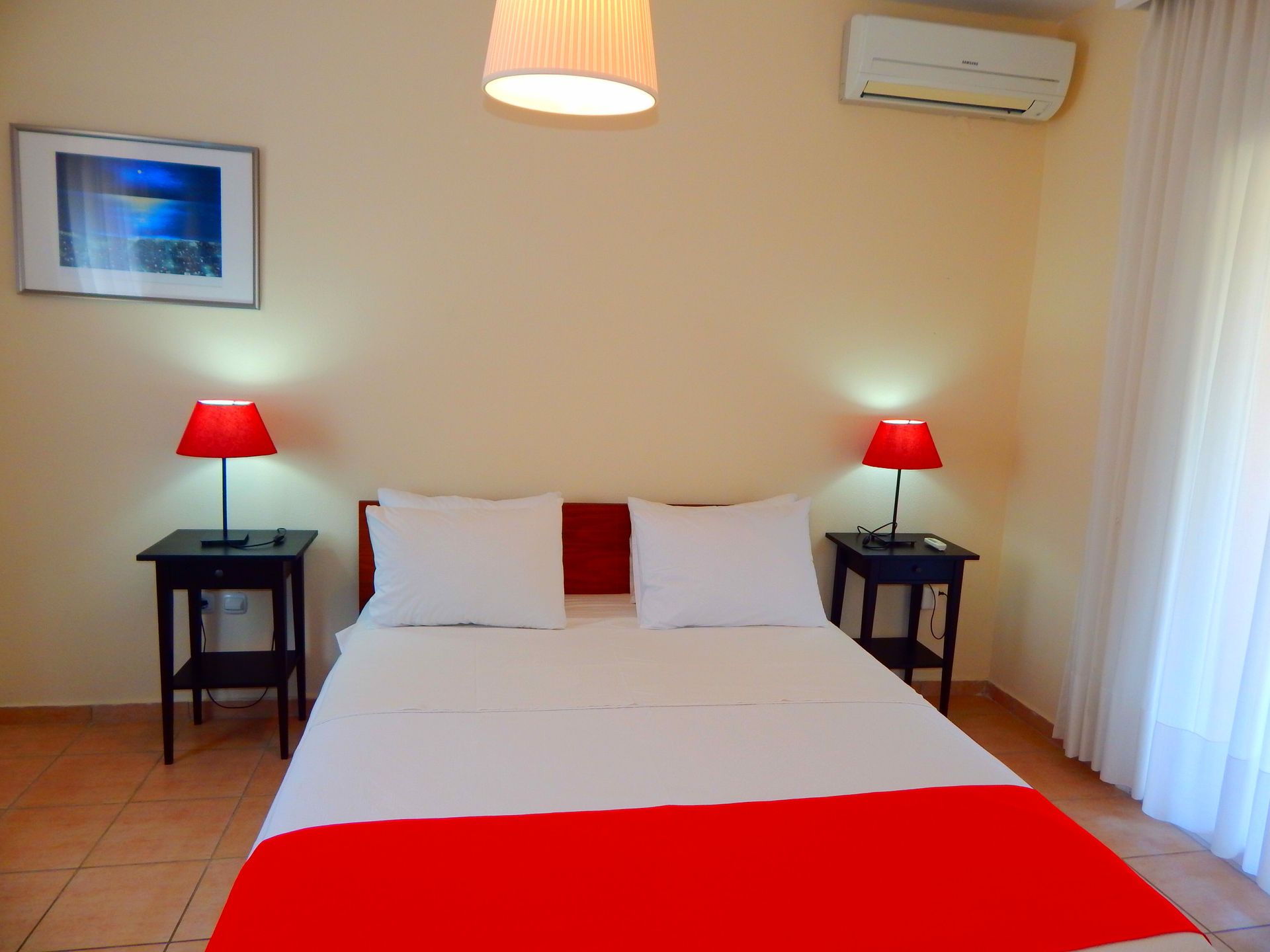 Kripis house villa Pefkohori.Second level-Double room in first floor -big balcony with  view to the garden.A/C.