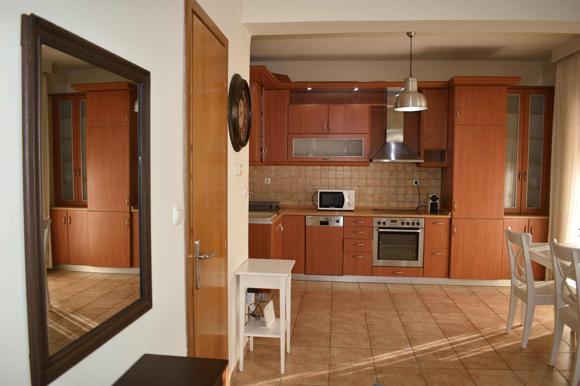 Kripis house villa PefkohoriFirst level- Sitting room with kitchen and private small garden. Also small WC in this level- A/C