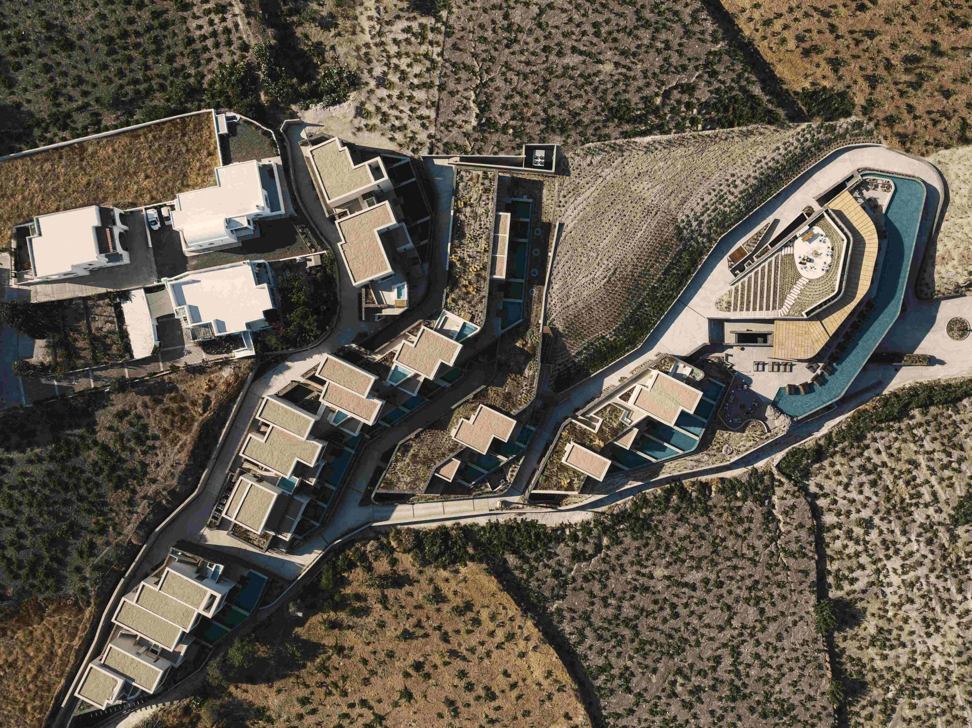 A Rare Cycladic Hideaway perfectly positioned in Vourvoulos village far from bustling crowds, yet just a short ten-minute drive from the island's renowned landmark locations.