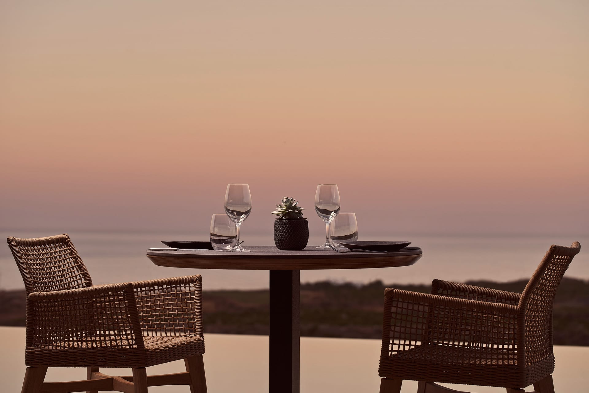 Elevate your stay or propose with a private dining, resembling a butler's ballet beneath Santorini's starry embrace. Let the stars dance their charm and the Aegean breeze craft the stage.
