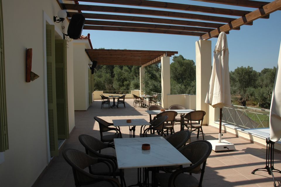 Balcony of the GERA'S OLIVE GROVE venue and meals area