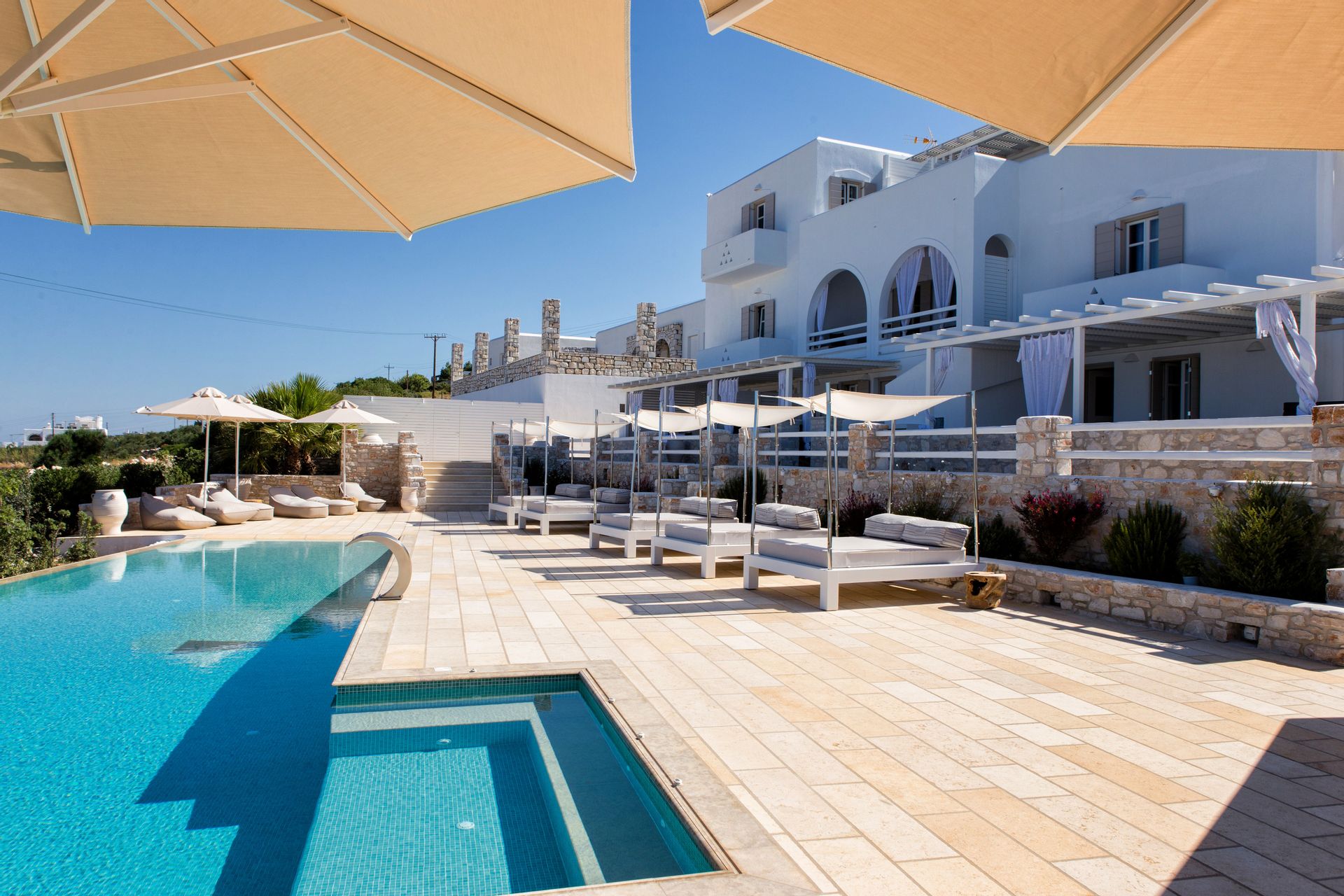 Anna Platanou Suites building and pool