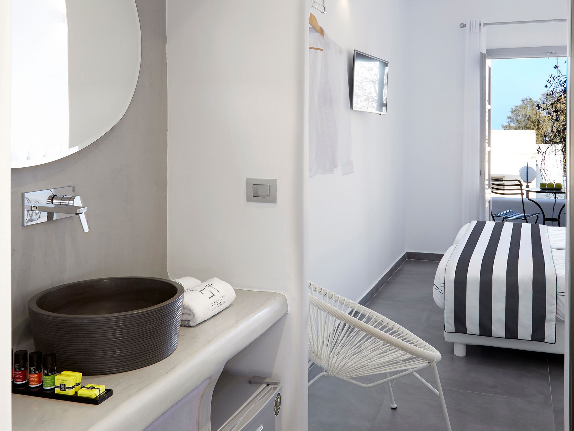 Elegant White Deluxe Room with Private Balcony