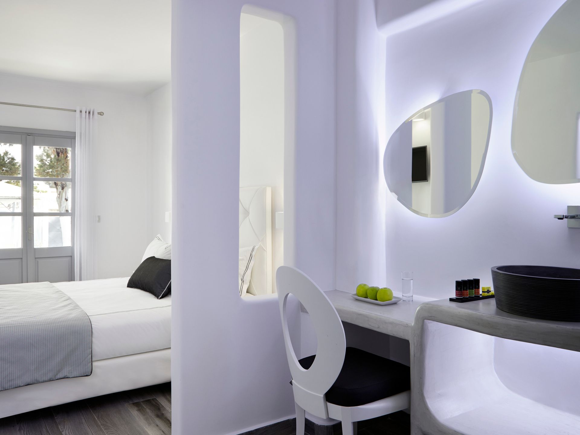 Elegant White Deluxe Room with Private Balcony