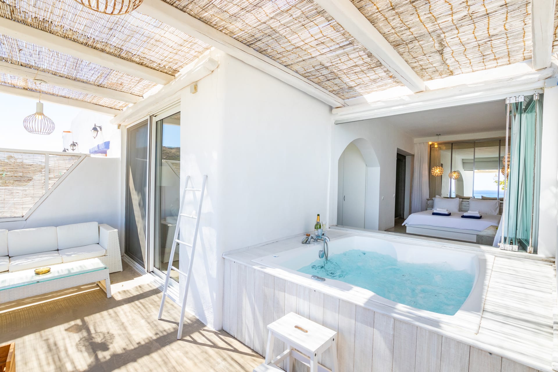 Deluxe suite Poseidon Blue with outdoor jacuzzi
