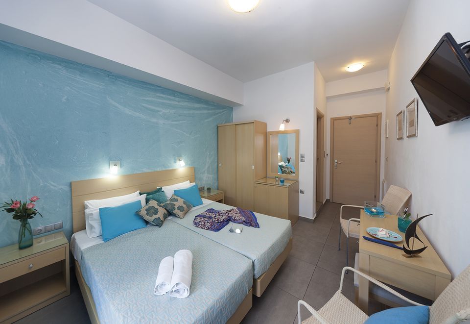 Double or Twin Room with Side  Sea View (Ground Floor)