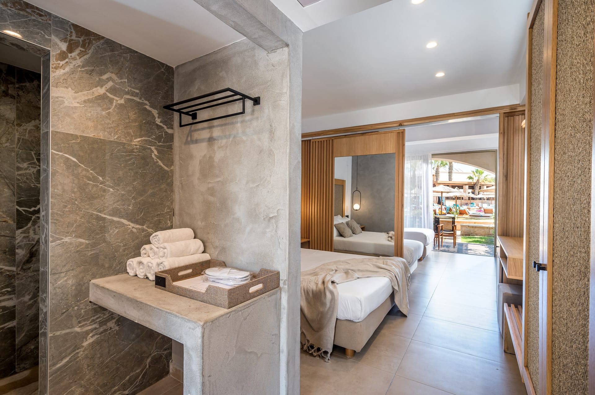 Family room with two bedrooms and pool view/garden view